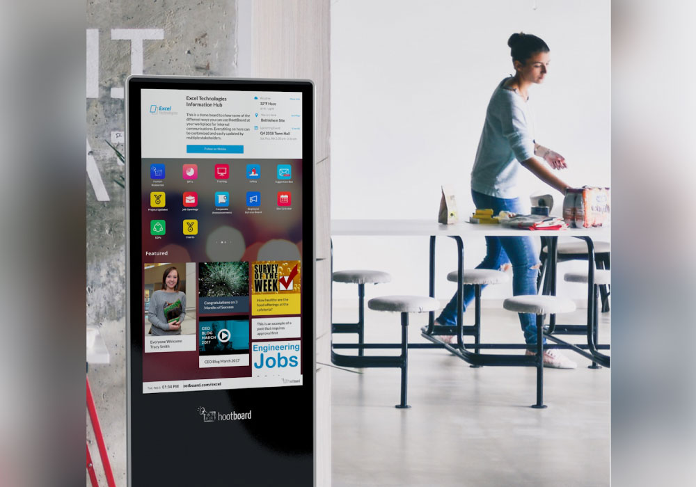 a touch kiosk in a cafeteria for employees