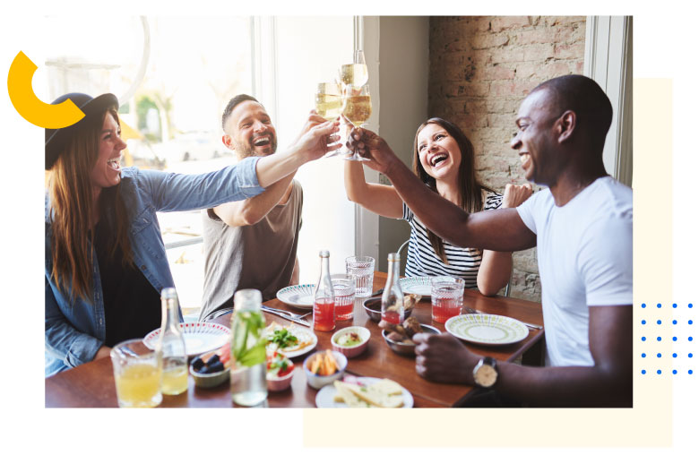 people toasting at a table