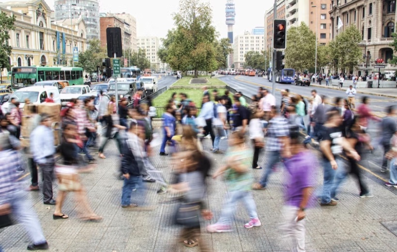 a crowd walking in the street