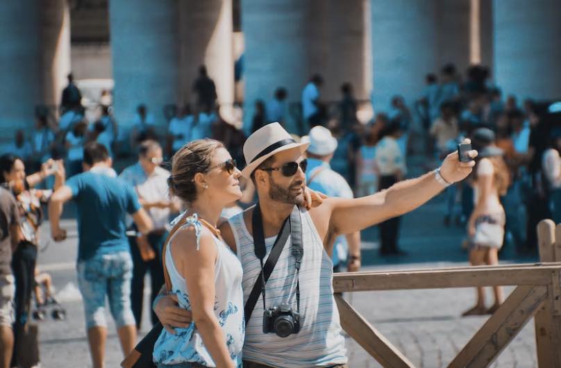 a couple taking a selfie on vacation