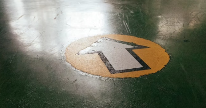 a floor graphic that helps people know where to go